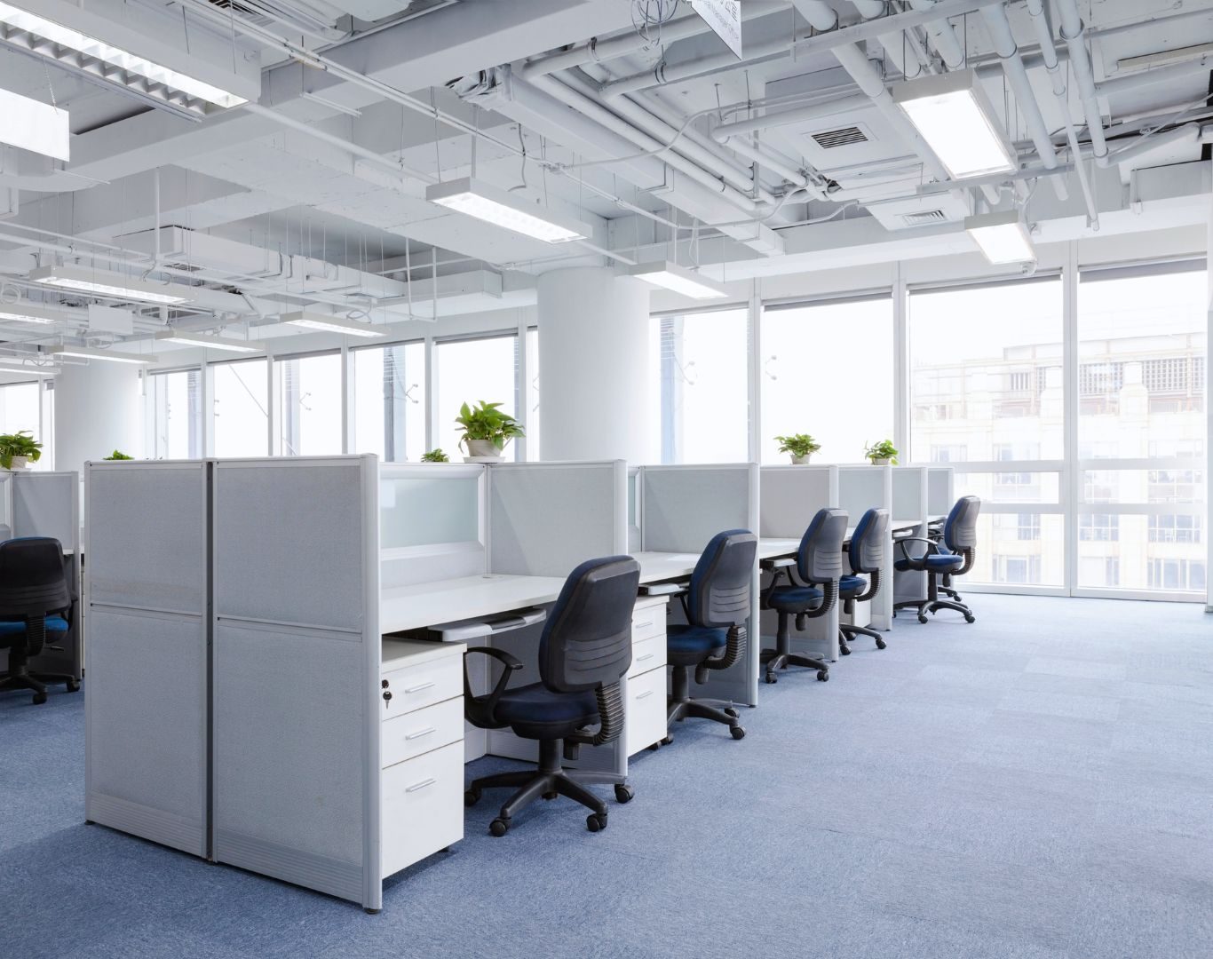 Disinfecting desks during commercial cleaning near me in Brampton, ON by Apex Home Cleaning